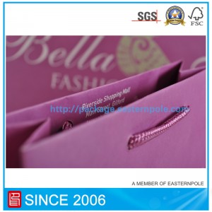 Pungă de hârtie purpurie cu mâner înnodat